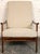 Mid-Century Modern walnut high-back lounge chair featuring a sculptural walnut frame and elegant, clean lines. Newly...