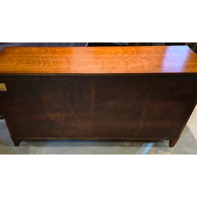 Featured is this beautifully crafted Vintage Kindel Furniture French Regency Louis XVI Style Cherry Wood Sideboard which...