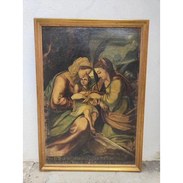 Ancient religious painting from the 17th century 17th century religious painting. Santa catarina. Latin writing....