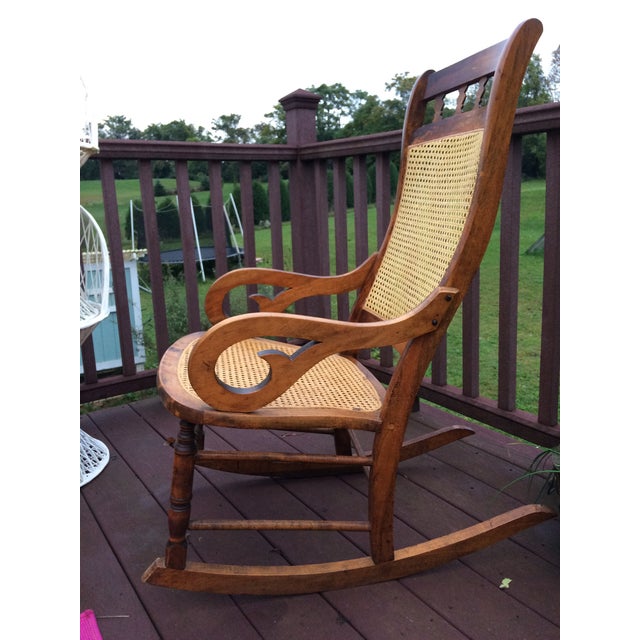 Hand Carved Oak and Cane Rocking Chair Chairish
