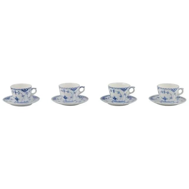 Royal Copenhagen Blue Fluted Half Lace. A set of four coffee cups with saucers. Model number: 1/719. Dating: Approximately...