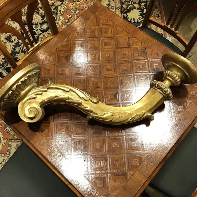 Hand carved wooden candle sconce with picket in a gold leaf, circa 1890. Italy