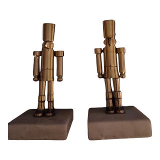 Vintage Decorative Metal Nutcracker Figurines Mounted on Marble Bases For Sale