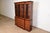 A gorgeous Georgian or Chippendale style lighted breakfront bookcase or dining cabinet By Henkel Harris USA, 1991 Carved...