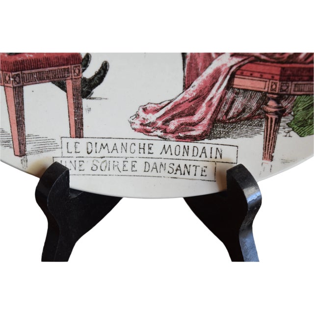 BOCH FRÈRES "LE DIMANCHE MONDAIN" DECORATIVE PLATE Era: 1920s Maker: Boch Frères La Louvière, Belgium Style: Art...