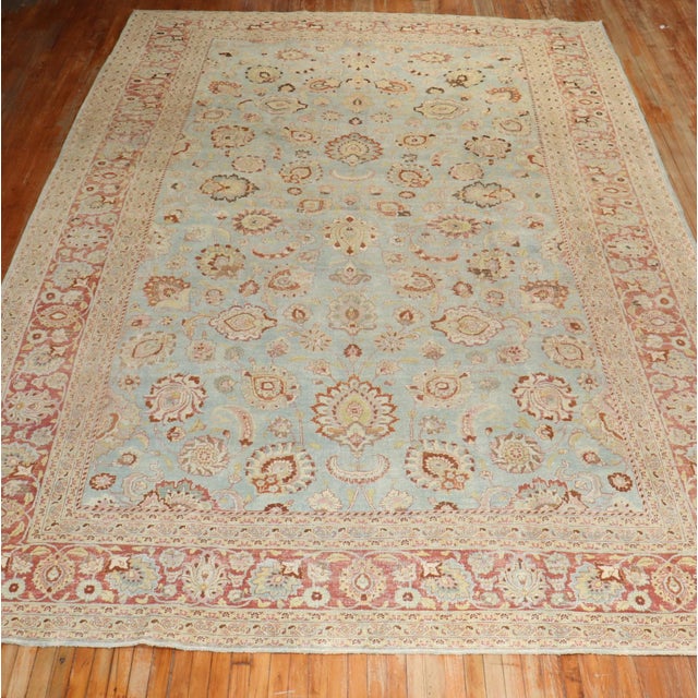 An early 20th Century Persian Meshed with a light blue Background