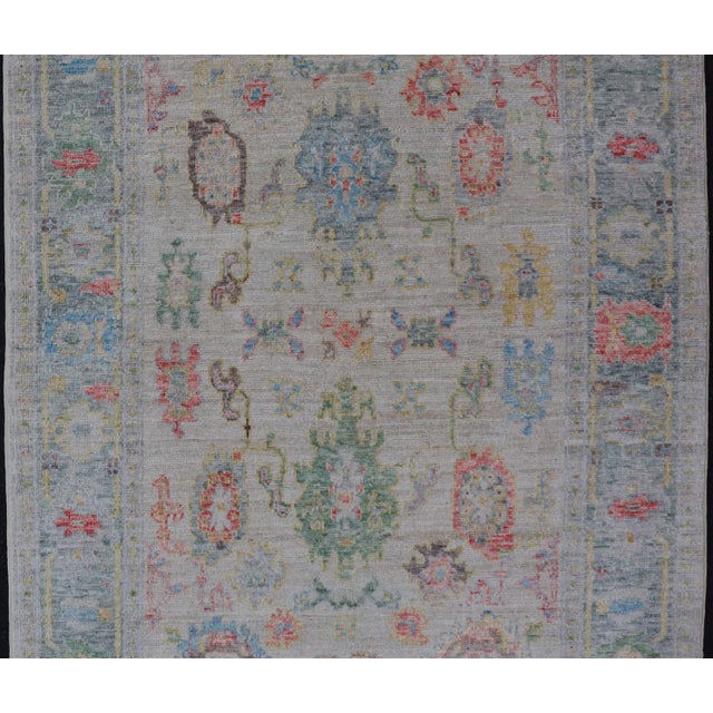 Traditional Modern All-Over Floral Oushak With Muted Background and Accent Colors For Sale - Image 3 of 10