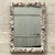 Bring the ocean indoors with this stunning vintage coastal mirror, encrusted with a variety of natural seashells....