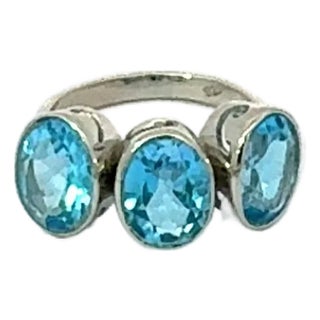 Classic 3 Stone Blue Topaz 7.24 Carat Oval Ring Set in Sterling Silver by Carat&her- Size 8 For Sale
