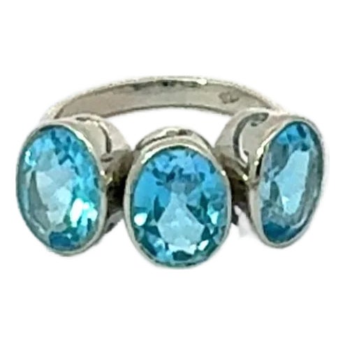 Classic 3 Stone Blue Topaz 7.24 Carat Oval Ring Set in Sterling Silver by Carat&her- Size 8 For Sale