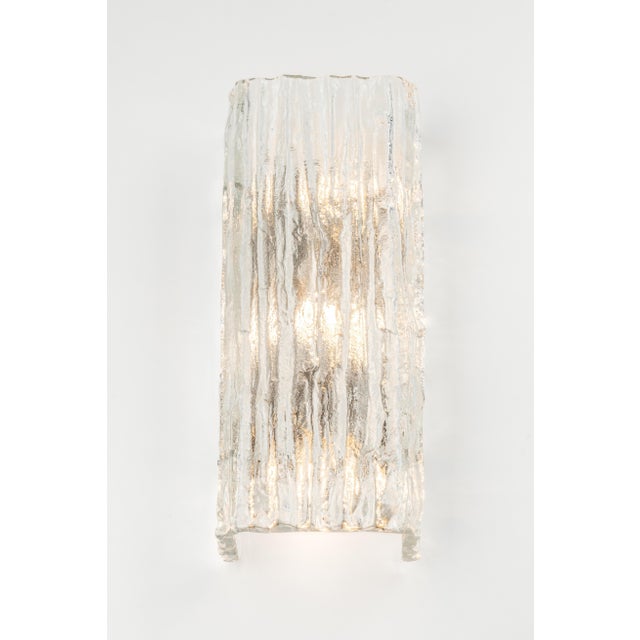 Wonderful pair of mid-century ice glass wall sconces made by kalmar, austria, manufactured circa 1960-1969. High quality...