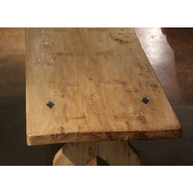 This elegant antique dining table was crafted in Normandy, France circa 1780. Built from solid oak, the long rectangular...