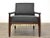 A beautiful solid mahogany mid century modern lounge chair with exposed straps and new dark charcoal grey upholstry. Seat...