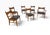 A striking set of six Mid-Century Modern Lane “Tuxedo” dining chairs, circa 1960s. Crafted in warm walnut, these chairs...