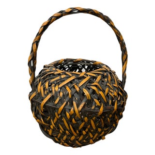 Small Round Orange and Black Basket with Curved Handle For Sale
