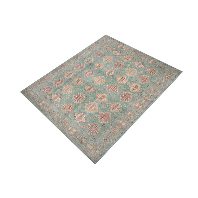Enhance your home with this exquisite hand-knotted Kazak rug, crafted from fine hand-spun wool and dyed with all-natural...