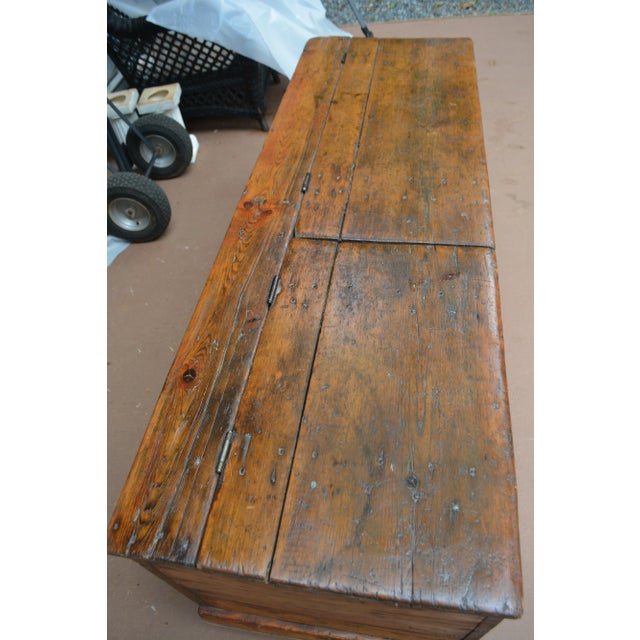 What an amazing storage trunk! Purchased in Europe, probably England. A thick & rustic pine wood with the most gorgeous...