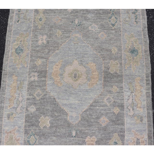 Textile Turkish Oushak Rug With Soft Gray Field and Pale Blue Medallion For Sale - Image 7 of 12