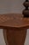 Elegant mid-century side table featuring a striking octagonal silhouette and an intricately crafted marquetry tabletop....