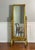 1970s Hollywood Regency style giltwood cheval full-length floor mirror. A striking swivel mirror featuring a tailored...