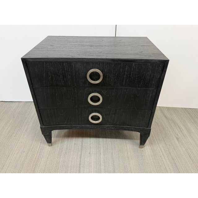 Design Plus Gallery presents the Atherton Onyx Nightstand for Brownstone. This three-drawer bedside table has a deep onyx...