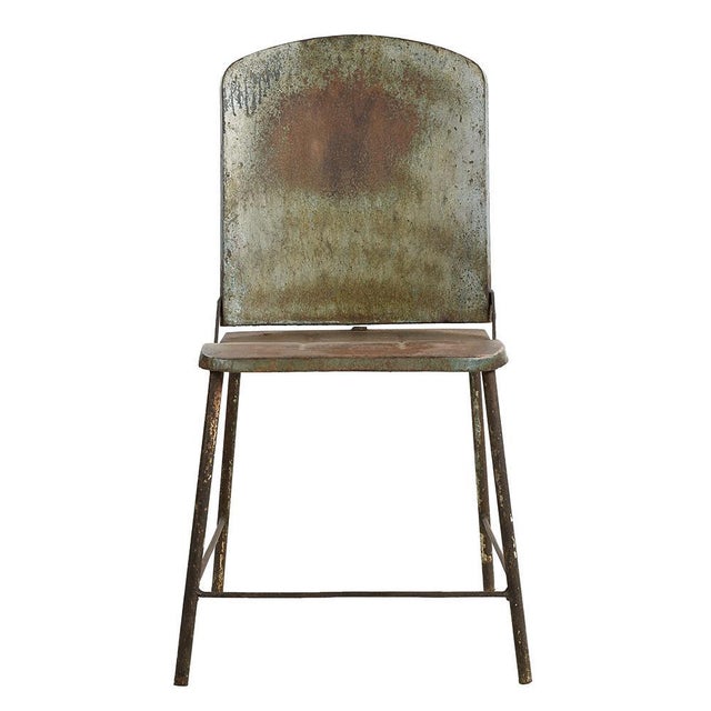 Vintage Industrial Chair in Metal, in Good conditions. This piece is designed in the style of the selected designer and/or...