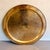 A spectacular oversized vintage brass tray or wall art piece featuring beautifully detailed etched decoration throughout....