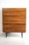 High cabinet with 3 doors in teak veneer. The inside of this cabinet is made of a lighter veneer. Some traces of use but...