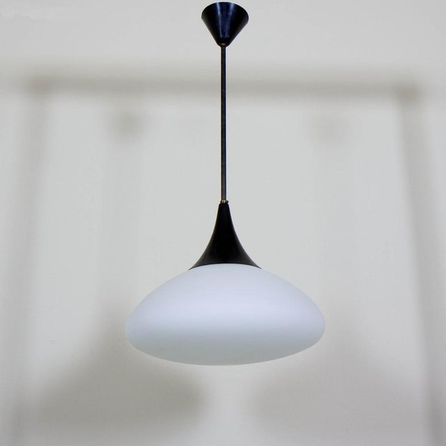 Opaline Glass Pendant Lamp, 1960s, in Very Good conditions. Designed 1960 to 1969 Up to 250V (Europe/UK Standard).The...