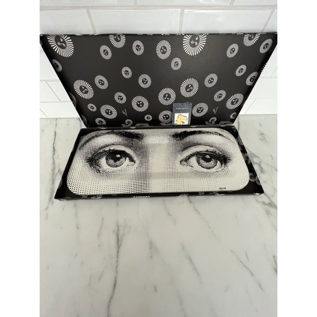 New In Box never used Fornasetti Tray Material of the Fornasetti tray: 100% wood Populus Leuce The tray, with its shape...