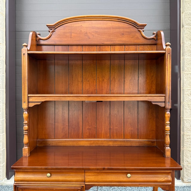 A vintage Lexington Furniture French Country / Louis Philippe style cherry 5 drawer writing desk with bookcase top....