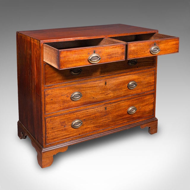 This is an antique gentleman’s tallboy. An English, mahogany chest of drawers, dating to the Georgian period, circa 1790....