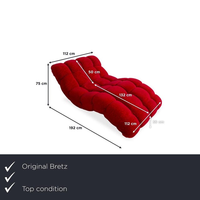 Exclusive designer chaise longue from Bretz with a high-quality red fabric cover. This piece of furniture impresses with...