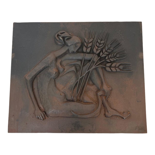 Modernist fireback depicting a woman with a belly and wheat teeth For Sale