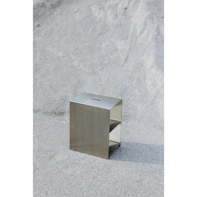 Cosmo multifunctional stool & shelf in brushed stainless steel by form & eisen dimensions: d 40 x w 27 x h 49 cm....