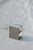 Cosmo multifunctional stool & shelf in brushed stainless steel by form & eisen dimensions: d 40 x w 27 x h 49 cm....