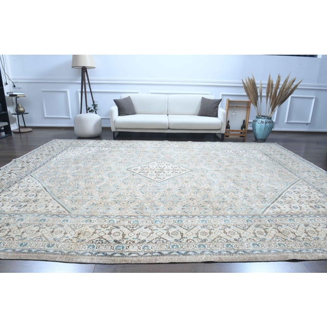 Vintage Persian Hand-Knotted area rug is a semi-antique vintage area rug. The '70s Eastern region of Anatolian's unique...