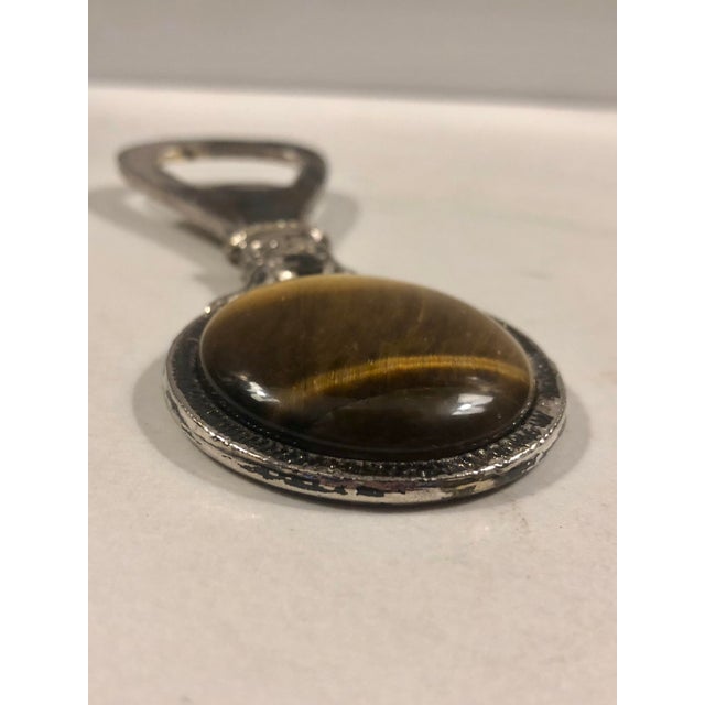 This unique Vintage Tigers Eye Bottle Opener will be a conversation starter when serving up drinks in your bar area. The...