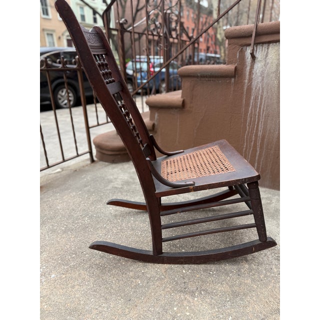 Early 20th/Late 19th Century Victorian Rocking Chair With Spindle Back and Cane Seat For Sale - Image 12 of 12