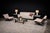 This pair of vintage satin glass table lamps reflects a design integrates both upper illumination and a secondary light...