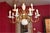 Offering for sale this lovely vintage polished brass and white porcelain/ceramic chandelier in outstanding condition and...