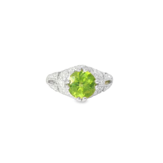 18K White Gold Peridot Diamond Ring Band. This stunning color-stone ring features one large round natural peridot 9 mm...