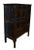 A dark brown lacquered Chinese cabinet from the early 19th century. This hand carved Chinese cabinet features 18 panels on...