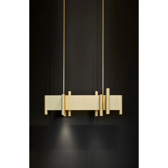 Hanging lamp made of aluminium provided with eight downlighters en three uplighters, each spot is individually DALI...