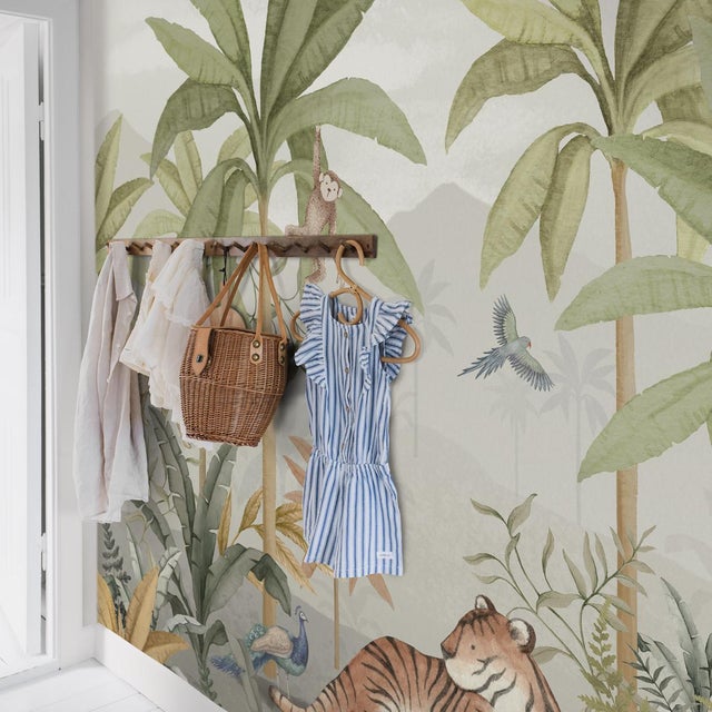 Playful monkeys, wild cats, and exotic birds frolic amid a dreamy tropical landscape in Boråstapeter’s Wild Jungle Mural,...