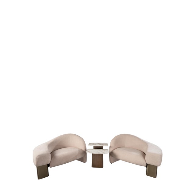 Make a bold yet elegant statement with this modern taupe accent chair, featuring a sculptural silhouette and soft bouclé...