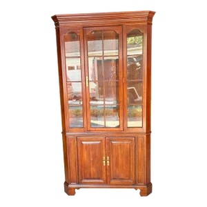 Late 20th Century Vintage Chippendale Style Solid Cherry Two Part Corner Cabinet.