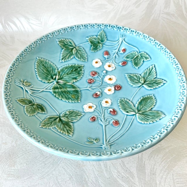A deliciously whimsical raised dish by Georg Schmider Majolica Daisy & Berry Footed 9 Inch Compote dish, Germany.