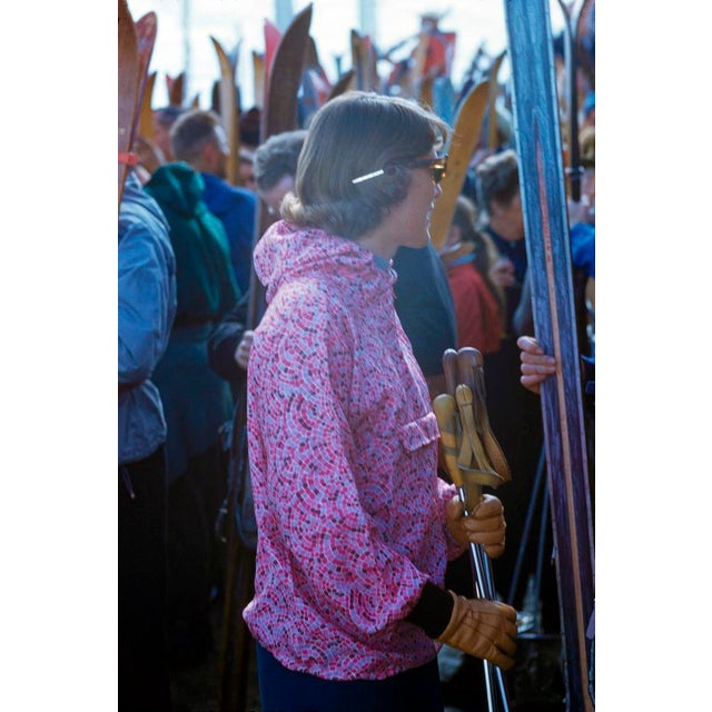 Party in Pink by Toni Frissell A woman in a bright pink parka parties at ski resort in Zermatt, Switzerland, 1956. (Photo...