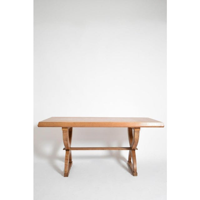 Curule console table, 1950s. Rectangular dining table, console table, or desk in ash with a chamfered top and an X shaped...